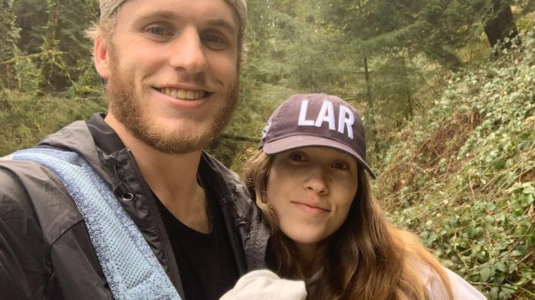 Cooper and Anna Kupp in a forest 