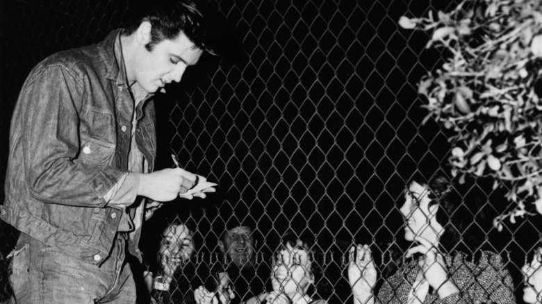 Elvis Presley with fans