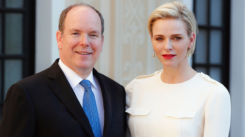 Prince Albert II of Monaco and Princess Charlene of Monaco attending the Monaco Palace cocktail party of the 55th Monte Carlo TV festival 