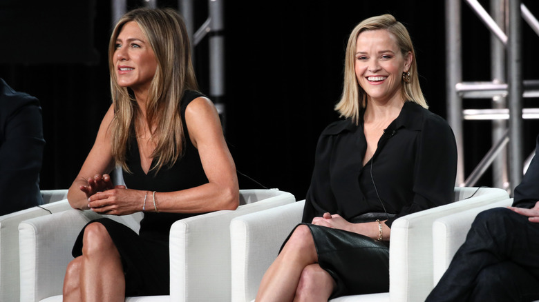 Reese Witherspoon and Jennifer Aniston laughing