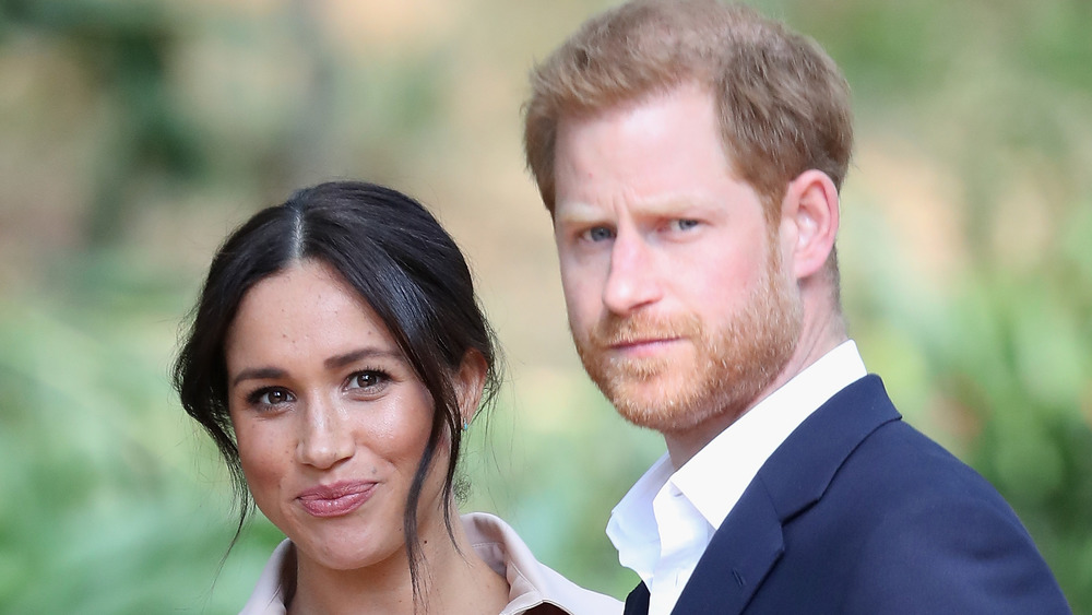 Meghan Markle and Prince Harry staring