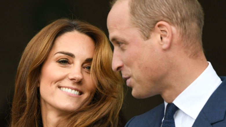 Kate Middleton smiling at Prince William