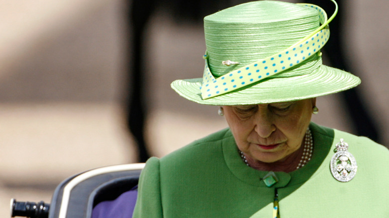 Queen Elizabeth II bowing her head