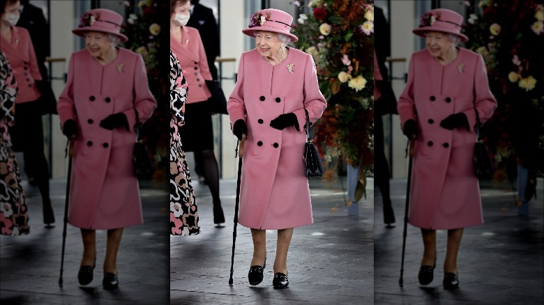 Queen Elizabeth using a walking stick