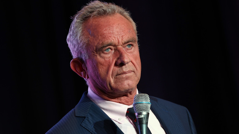 RFK Jr. holding a microphone