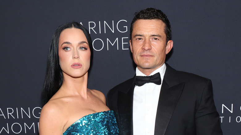 Orlando Bloom and Katy Perry pose at the 2024 Kering for Women dinner