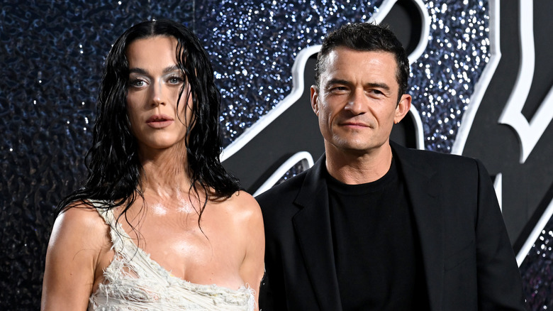 Orlando Bloom and Katy Perry pose together at the 2024 MTV Movie Awards