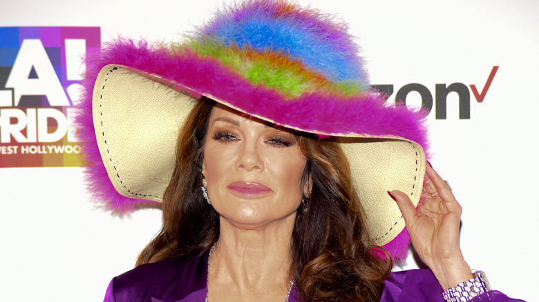 Lisa Vanderpump in a fuzzy rainbow hat