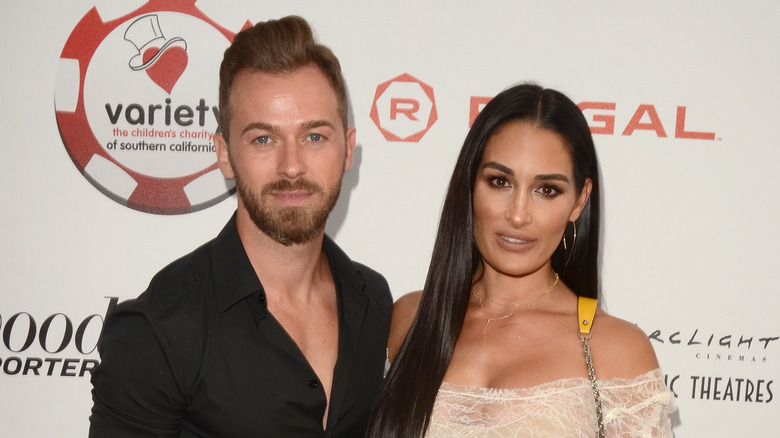 Nikki Bella and Artem Chigvintsev on the red carpet