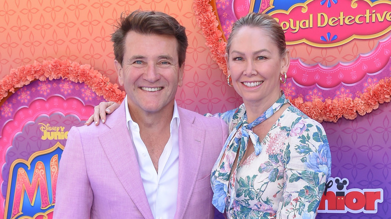 Kym Johnson and Robert Herjavec at an event