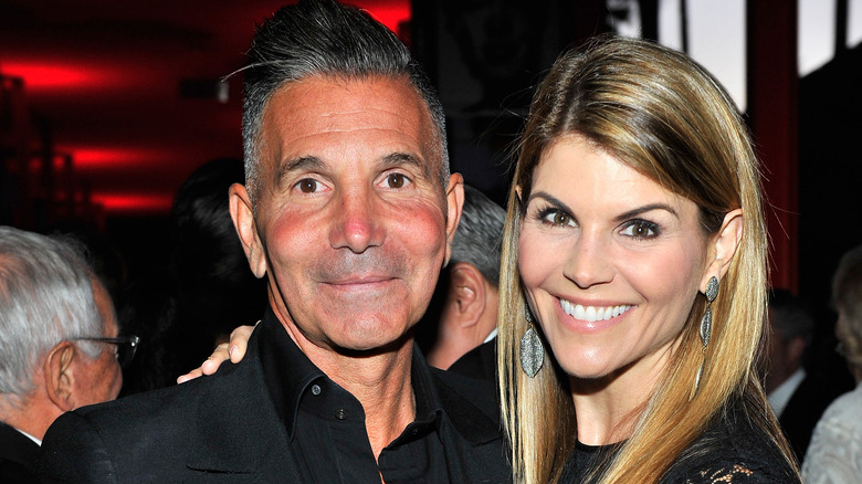 Mossimo Giannulli and Lori Loughlin smiling