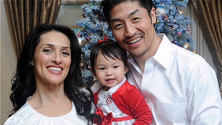 Brian Tee smiling family photo