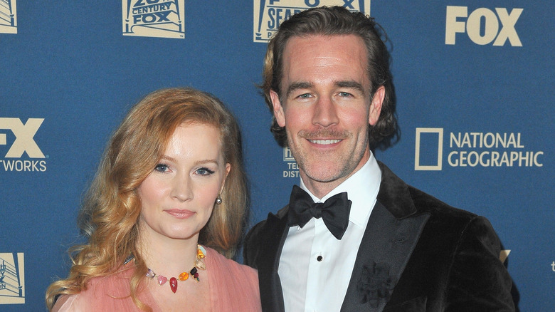 Kimberly and James Van Der Beek at event