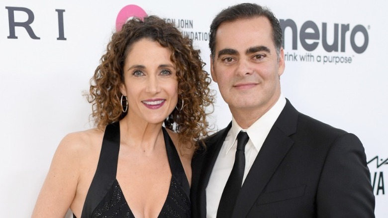 Melina Kanakaredes and Peter Constantinides, both smiling