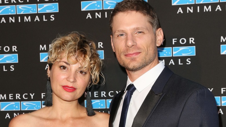 Michelle Armstrong and Matt Lauria posing