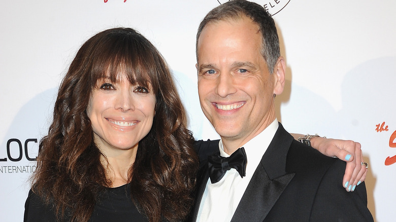 Liz Vassey and David Emmerichs smiling