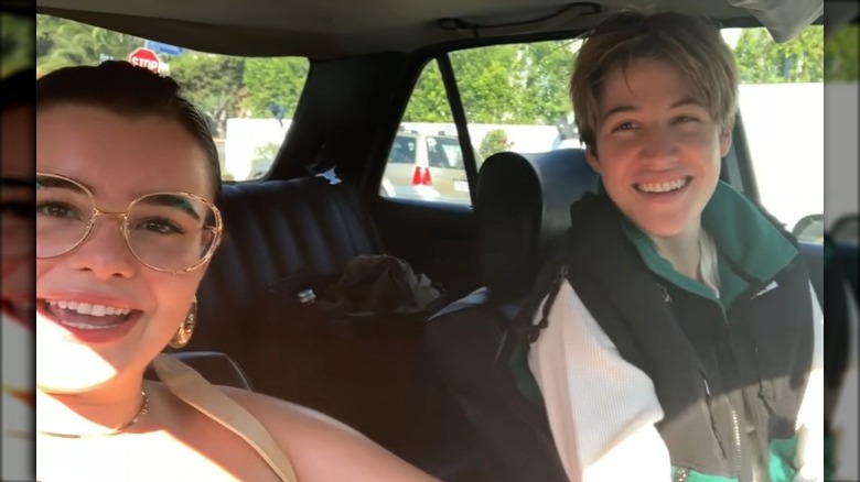 Barbie Ferreira and Elle Puckett smiling in car