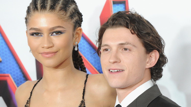 Zendaya and Tom Holland smiling 