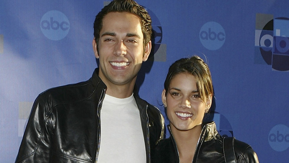 Missy Peregrym and Zachary Levi both smiling