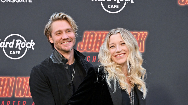 Chad Michael Murray and Sarah Roemer stand at red carpet event