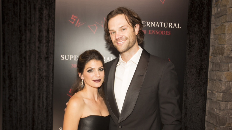 Jared and Genevieve Padalecki stand at red carpet event