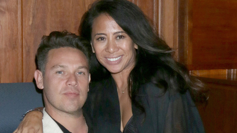 Kevin de Alejandro poses with his wife in 2019