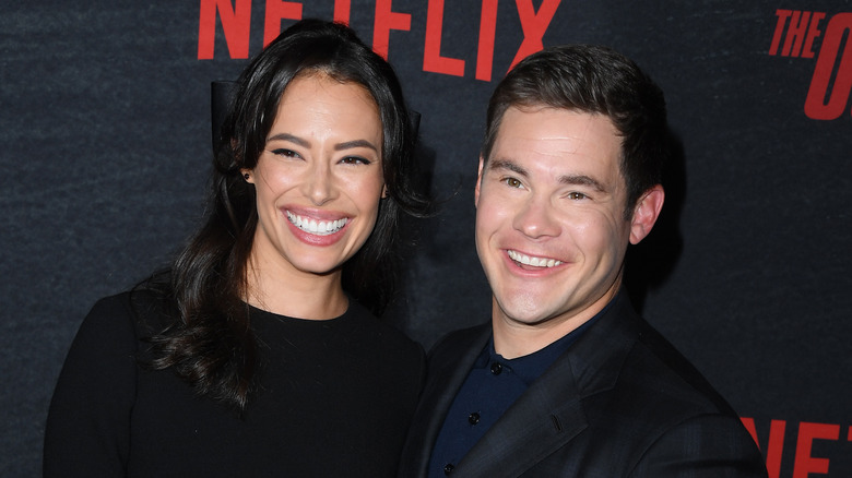 Chloe Bridges and Adam Devine smiling together