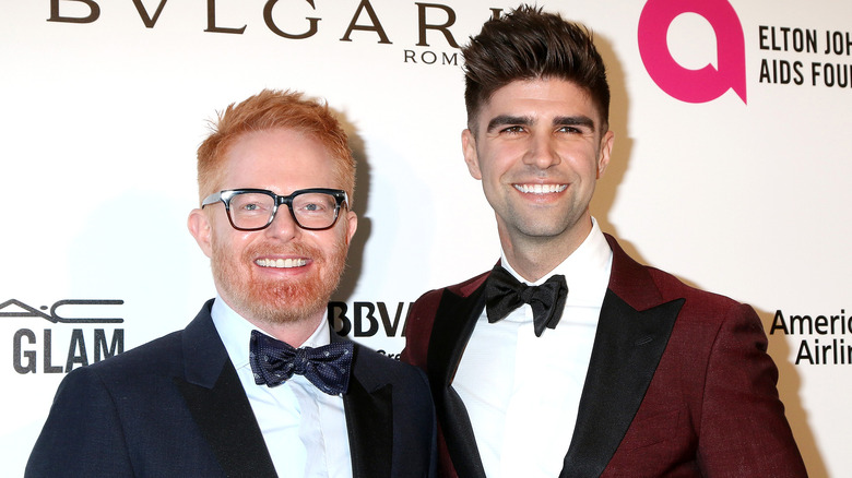 Jesse Tyler Ferguson and Justin Mikita posing together