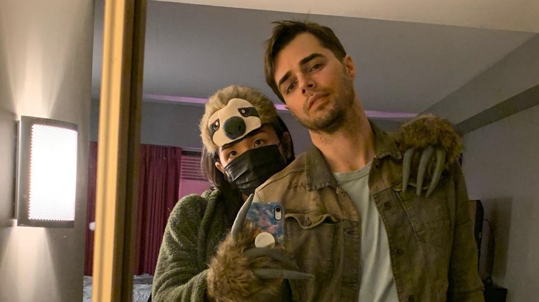 Sean Oh and Reid Ewing posing together, Sean wearing a sloth hat