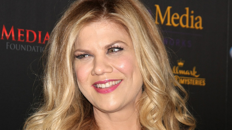 Kristen Johnston smiling at an event