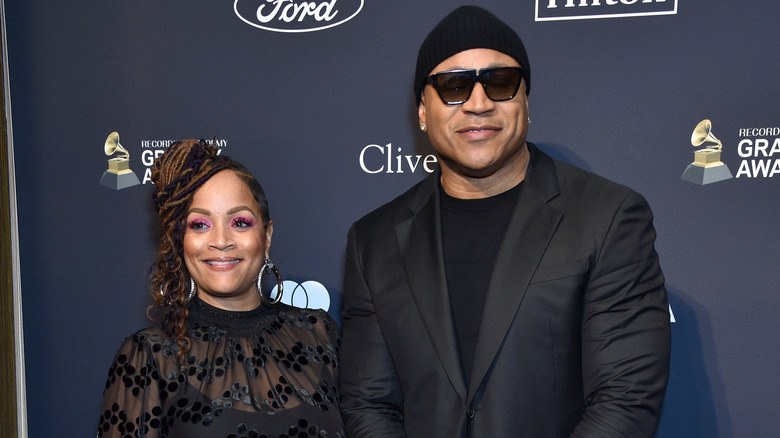 LL Cool J poses with Simone Smith on the red carpet 