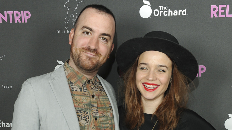 Renée Felice Smith and Chris Gabriel smiling 