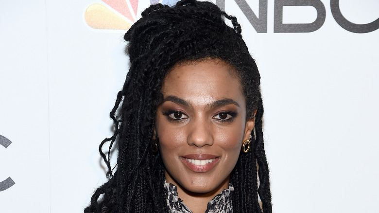 Freema Agyeman, smiling, 2020 NBC red carpet, hair half up