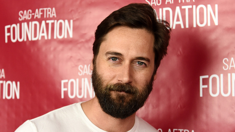 Ryan Eggold, 2019 photo, facial hair, more hair, not smiling