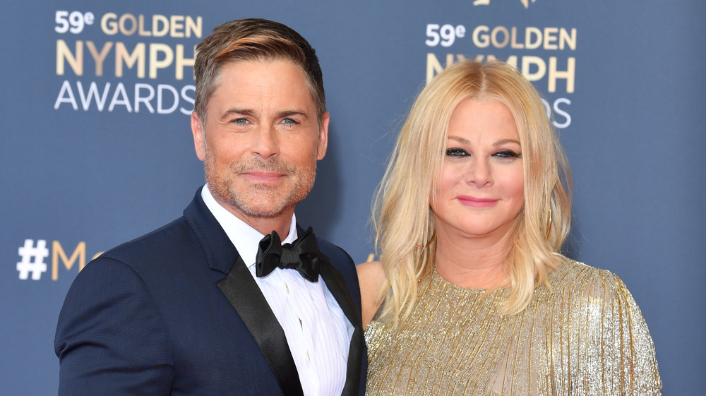 Rob Lowe and Sheryl Berkoff smiling