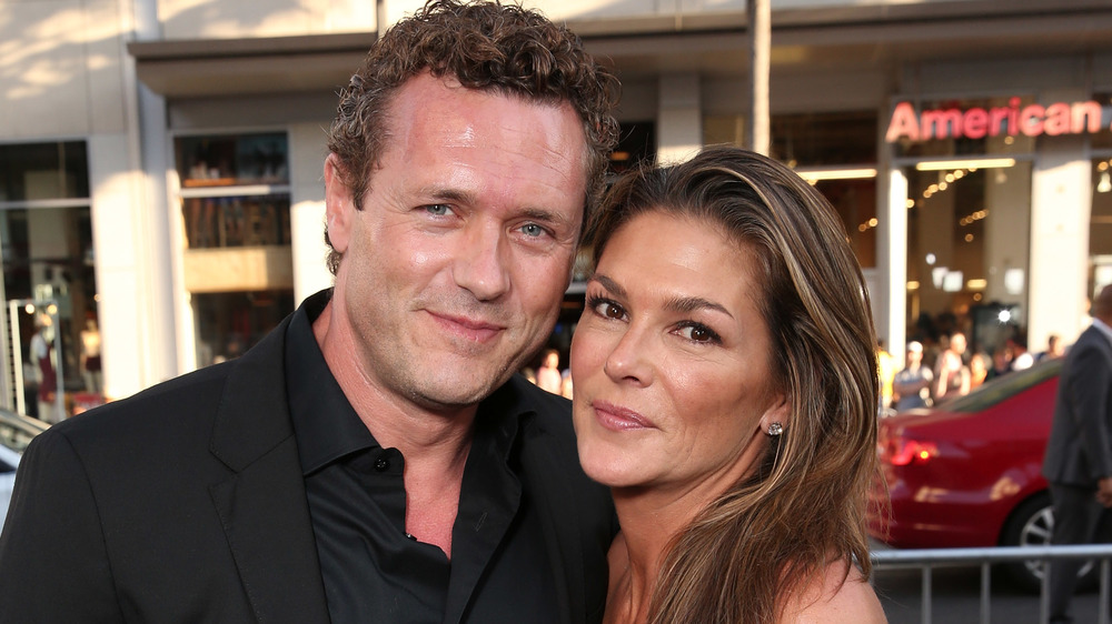 Jason O'Mara and Paige Turco posing together