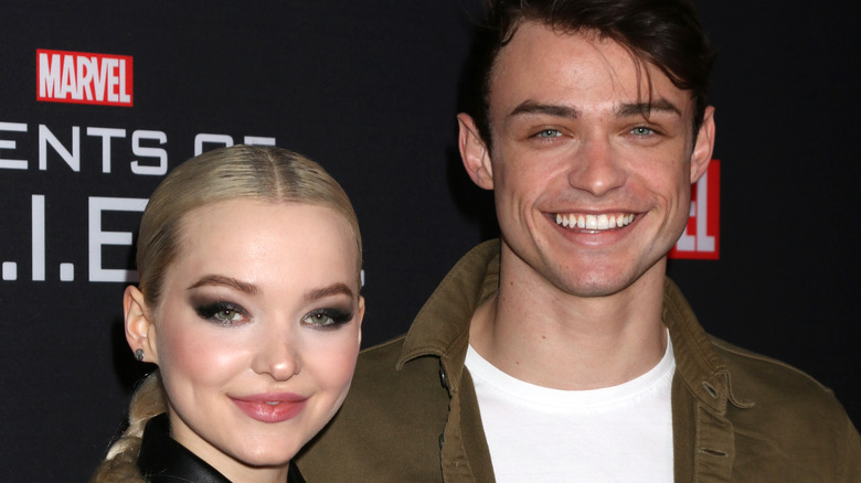 Thomas Doherty and Dove Cameron pose together in 2018