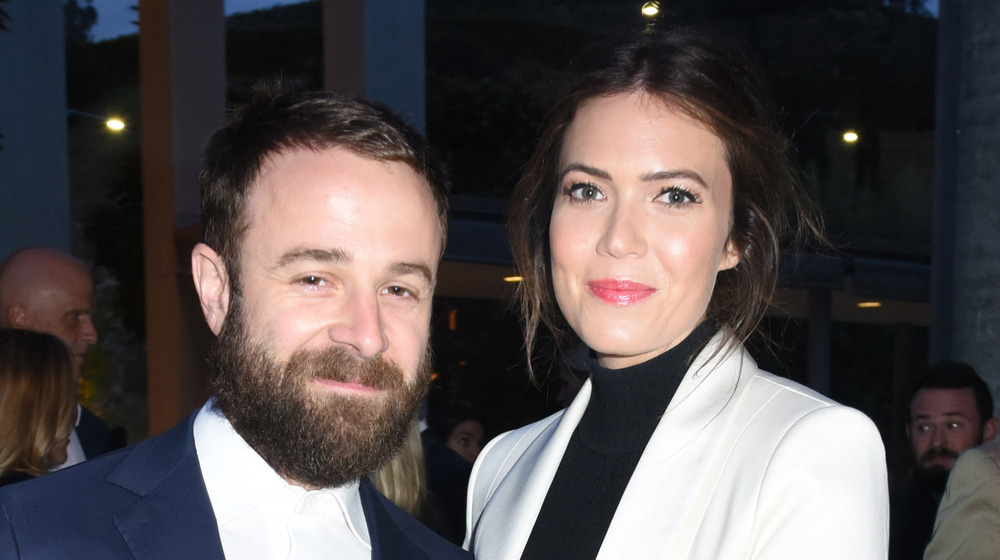 Taylor Goldsmith and Mandy Moore smiling