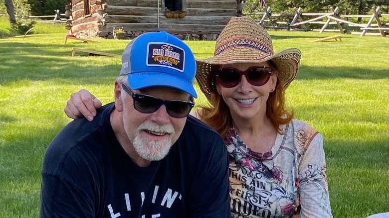 Rex Linn and Reba McEntire smiling