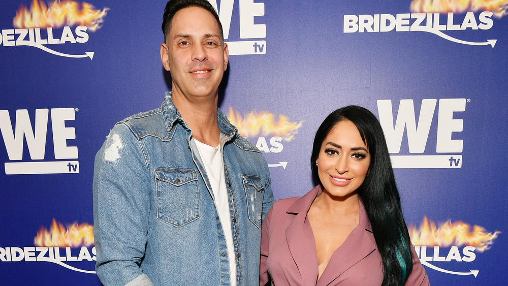 Chris Larangeira and Angelina Pivarnick on red carpet