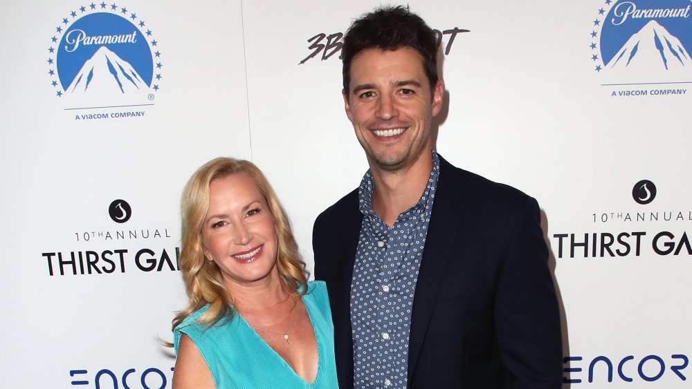 Angela Kinsey and Josh Snyder at a gala in 2019