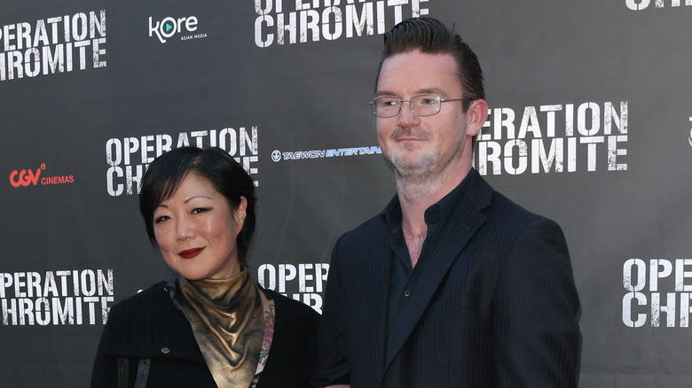 Margaret Cho and Al Ridenour posing for pictures