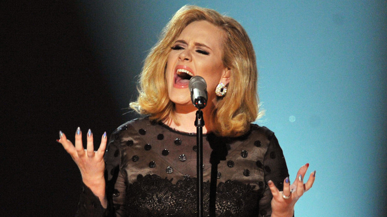 Adele singing on stage