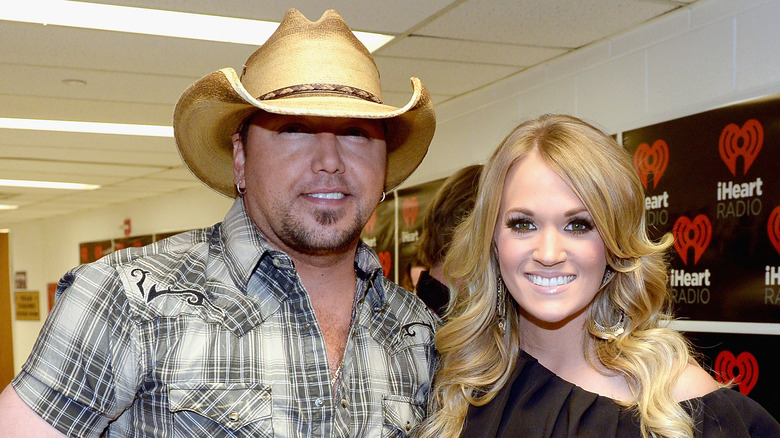 Jason Aldean and Carrie Underwood smiling