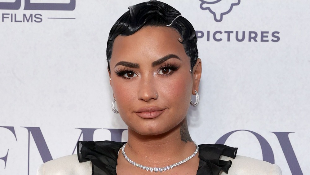 Demi Lovato poses at an event to promote her docu-series