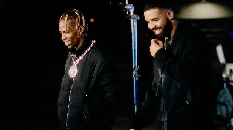 Drake and Travis Scott smiling