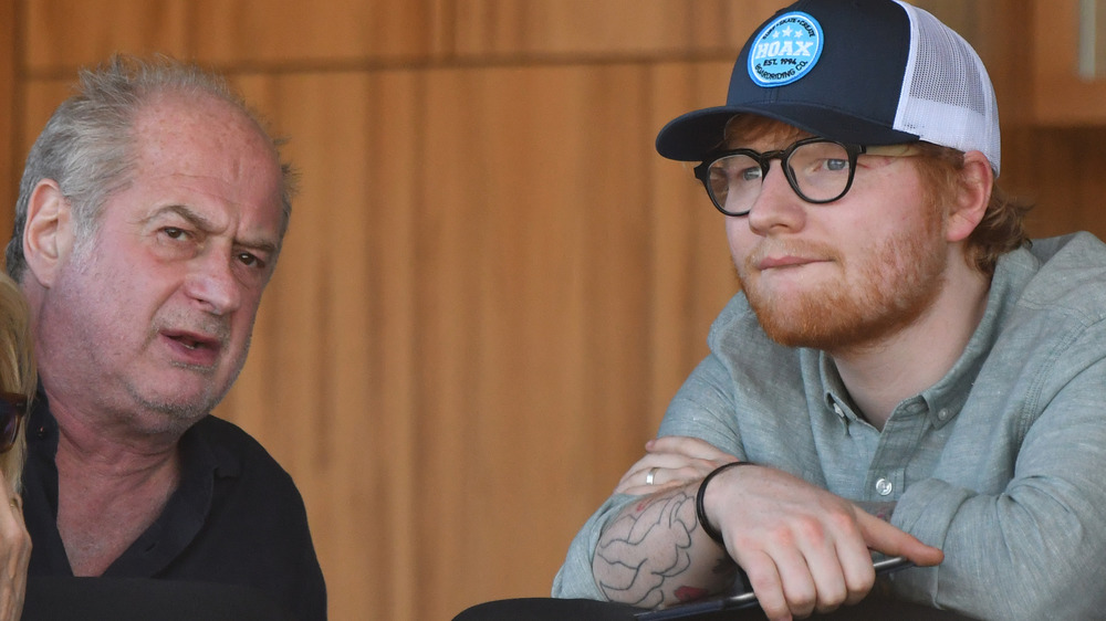 Ed Sheeran and Michael Gudinski sitting together