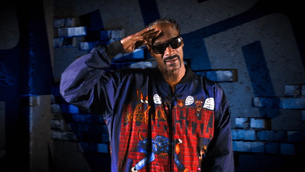 Snoop Dogg giving a salute 