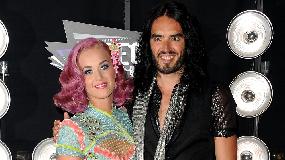 Katy Perry and Russell Brand posing