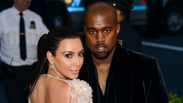 Kanye West and Kim Kardashian at an event 